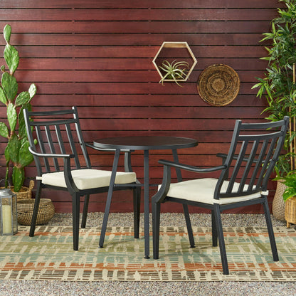 Elegant metal bistro table and chairs set, perfect for stylish outdoor dining spaces