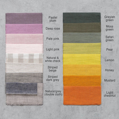 Elegant natural linen napkins arranged neatly on a dining table enhancing eco-friendly decor