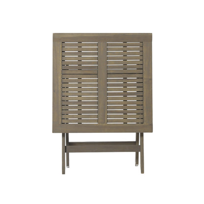 Foldable bistro table and chairs set ideal for compact dining spaces, combining functionality and elegance in design.