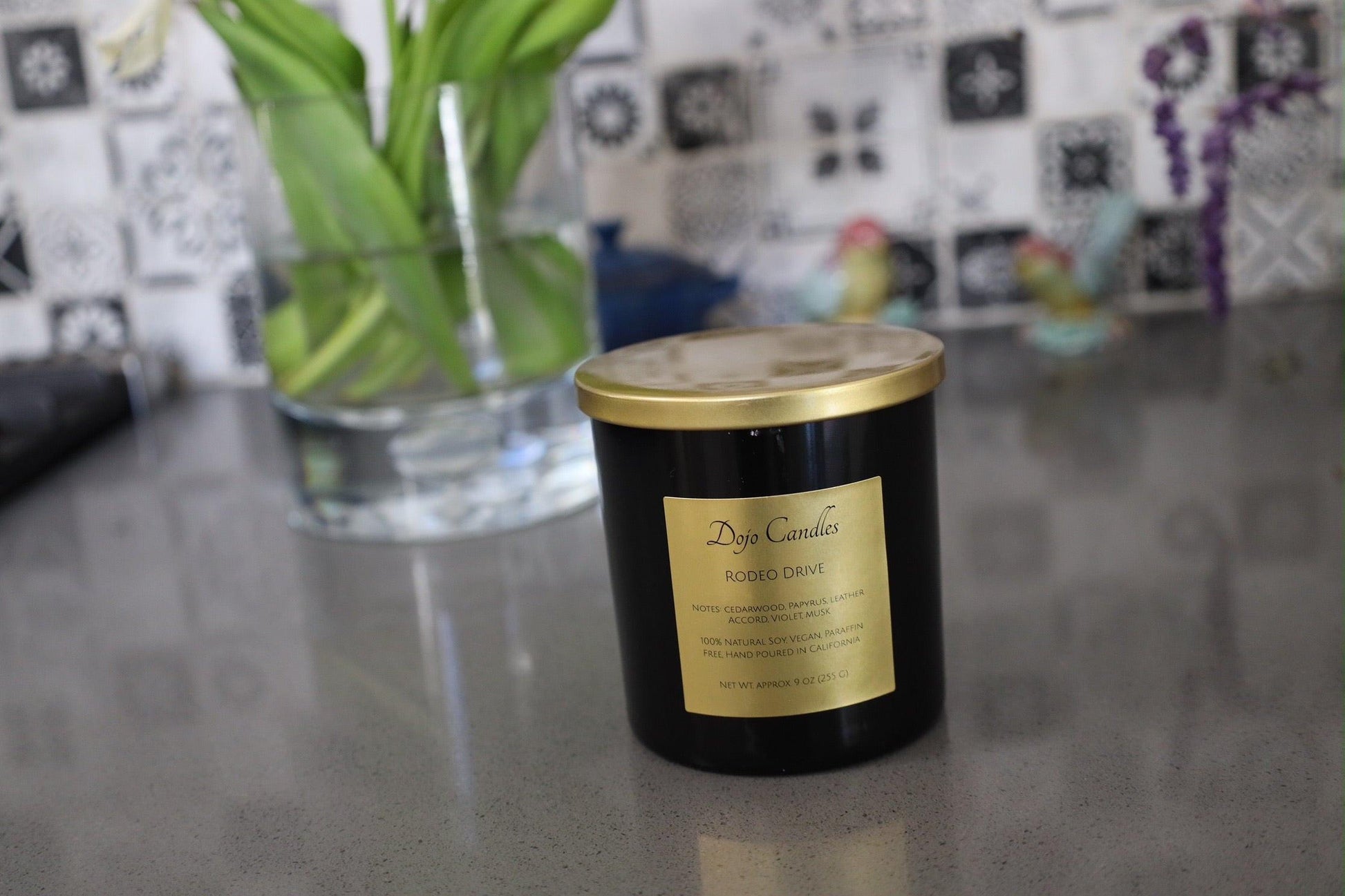 Luxury candle displayed elegantly on Rodeo Drive, symbolizing upscale ambiance and refined taste.