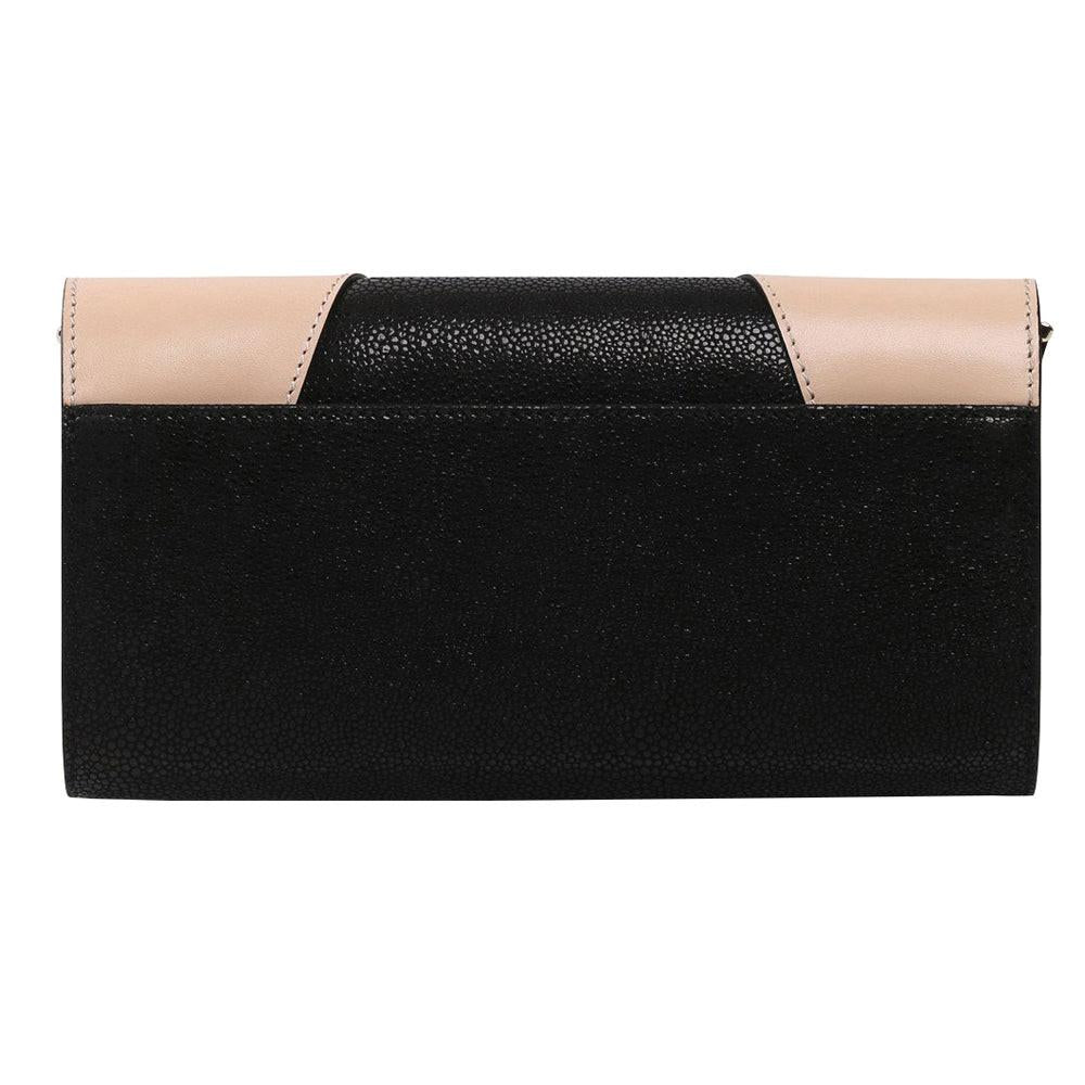 Elegant crossbody bag and stylish clutch combination perfect for formal occasions and daily use