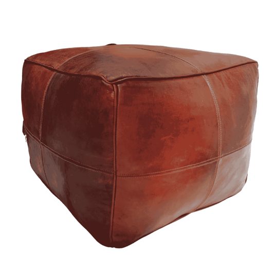 Elegant leather poufs designed for stylish and comfortable living spaces, enhancing modern interior decor.